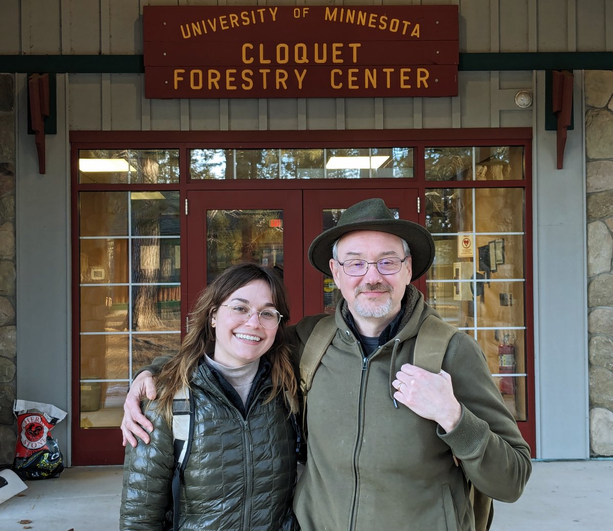 students Rose Picklo and Matt Picklo outside Cloquet Forestry Center entrance